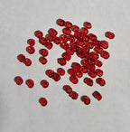 Détail perles rouge vif pour mosaïque artisanale