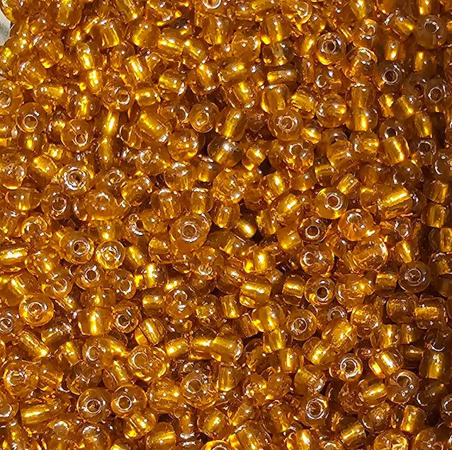 Perles de rocaille ambre topaze silver-lined 4mm — Mosaic Dream