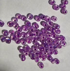Détail perles violet améthyste pour mosaïque artisanale