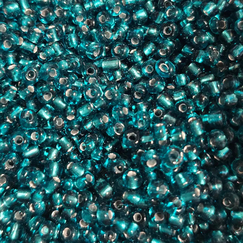 Perles de rocaille turquoise canard silver-lined 4mm — Mosaic Dream