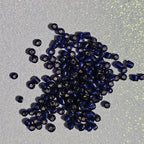 Détail perles bleu nuit pour mosaïque artisanale