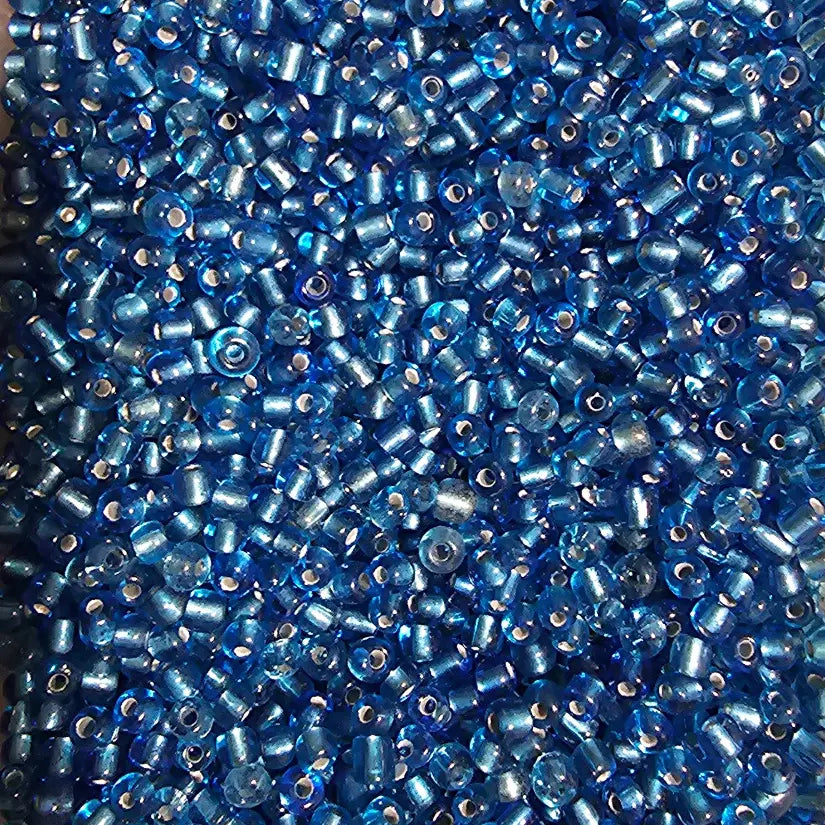 Perles de rocaille bleu saphir silver-lined 4mm — Mosaic Dream